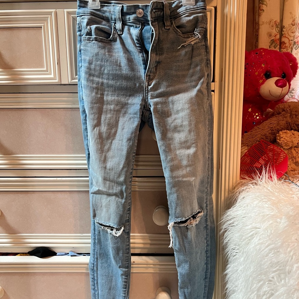 Women’s Light Blue Distressed Skinny Jeans (00)